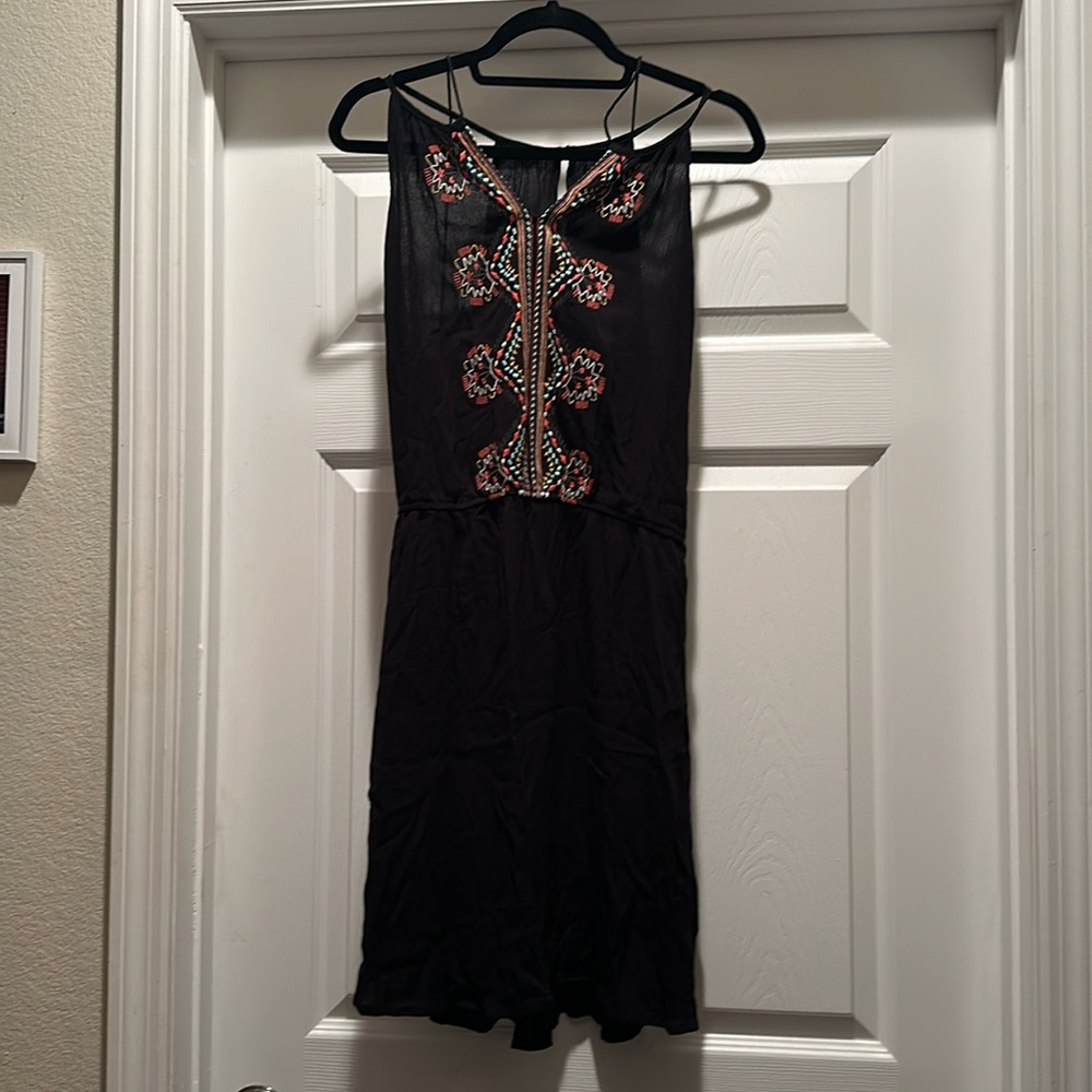 Be cool black dress with colorful details. Size L.